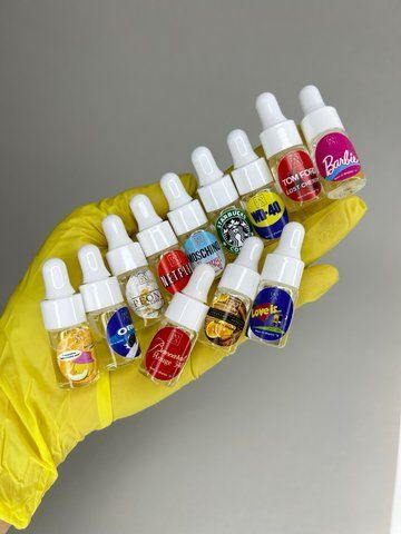 Набір міні-олійок  NailDoza мікс (10 шт. *3 мл) (аромати можуть відрізнятись від фото) Набір міні-олійок  мікс аромати NailDoza (10 шт. *3 мл) фото