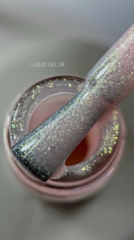 Рідкий гель Saga Professional Liquid Gel 39 персиково-рожевий з блискітками та шимером 15 мл  Рідкий гель Saga Professional Liquid Gel 39 персиково-рожевий з блискітками та шимером 15 мл  фото