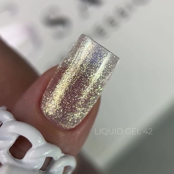 Рідкий гель Saga Professional Liquid Gel 42 блідий золотистий хакі з блискітками та шимером 15 мл  Рідкий гель Saga Professional Liquid Gel 42 блідий золотистий хакі з блискітками та шимером 15 мл  фото