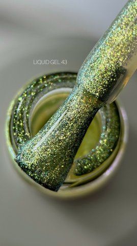 Рідкий гель Saga Professional Liquid Gel 43 золотистий з блискітками та шимером 15 мл Рідкий гель Saga Professional Liquid Gel 43 золотистий з блискітками та шимером 15 мл фото