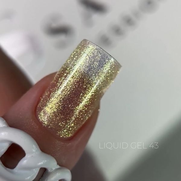 Рідкий гель Saga Professional Liquid Gel 43 золотистий з блискітками та шимером 15 мл Рідкий гель Saga Professional Liquid Gel 43 золотистий з блискітками та шимером 15 мл фото
