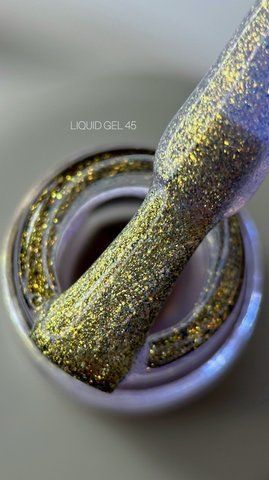 Рідкий гель Saga Professional Liquid Gel 45 золотисто-персикой з блискітками та шимером 15 мл  Рідкий гель Saga Professional Liquid Gel 45 золотисто-персикой з блискітками та шимером 15 мл  фото
