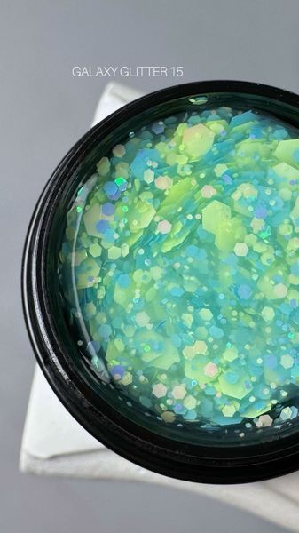 SAGA professional Galaxy glitter 15, (прозорий з блакитними та салатовими голографічними блискітками), 8 мл SAGA professional Galaxy glitter 15, (прозорий з блакитними та салатовими голографічними блискітками), 8 мл фото